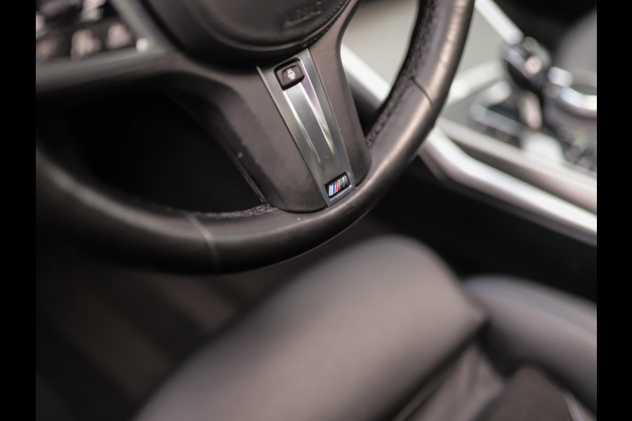 BMW 3 Serie Touring 320d xDrive High Executive | M-Sport | Camera | Trekhaak | Pano | Keyless