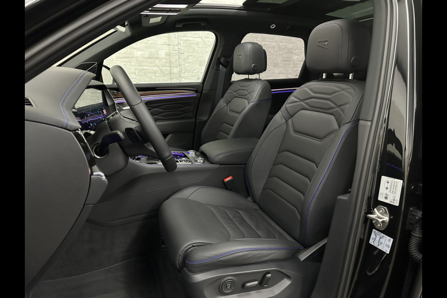 Volkswagen Touareg R 3.0 TSI 462PK E-Hybrid | Luchtvering | Puglia-Leder | Panorama | DYN-Audio | Massage | Ventilatie | ACC | Trekhaak | Nachtzicht | Head-Up | Ergo-Comfort | 22" | Keyless-Entry | Memory | 4-Zone Clima | ISO-Glas | Stoelverwarming V+A | Dodehoek | Standkachel | Carplay | Draadloos Laden |