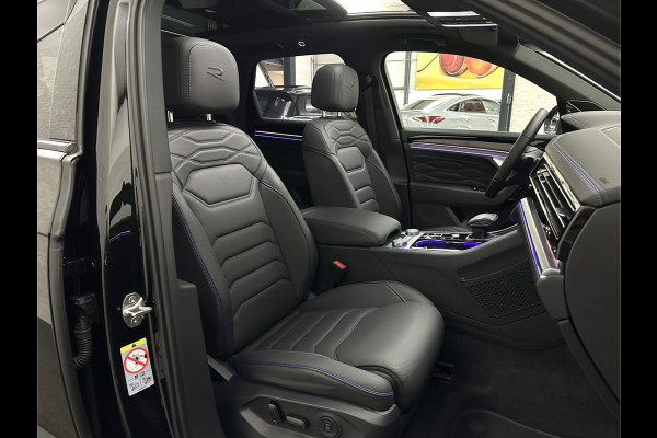 Volkswagen Touareg R 3.0 TSI 462PK E-Hybrid | Luchtvering | Puglia-Leder | Panorama | DYN-Audio | Massage | Ventilatie | ACC | Trekhaak | Nachtzicht | Head-Up | Ergo-Comfort | 22" | Keyless-Entry | Memory | 4-Zone Clima | ISO-Glas | Stoelverwarming V+A | Dodehoek | Standkachel | Carplay | Draadloos Laden |