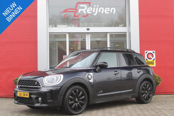 MINI Countryman 2.0 Cooper S E 220PK ALL4 CHILI | UNION JACK ACHTERLICHTEN | LEDEREN BEKLEDING | ELEKTRISCH BEDIENBARE VOORSTOELEN MET GEHEUGENFUNSCTIE OP DE BESTUURDERSSTOEL | STOEL/VOORRUIT VERWARMING | FULL LED KOPLAMPEN | DRAADLOZE APPLE CARPLAY/ANDROID AUTO | DRAADLOZE TELEFOONLADER | NAVIGATIE | EXTRA GETINTE ACHTERRUITEN | ZWART DAK | 18" LICHTMETALEN VELGEN BLACK 10 SPAAKS | ACHTERUITRIJ CAMERA | PARKEERSENSOREN VOOR EN ACHTER | CLIMATE CONTROL | KEYLESS ENTRY/START | HUD (HEAD UP DISPLAY) | ADAPTIVE CRUISE CONTROL | DAB+ RADIO | DONKERE HEMEL BEKLEDING |