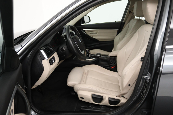BMW 3 Serie 318i Luxury Edition (DEALER ONDERHOUDEN, PARKEERSENSOREN, NAVIGATIE, AUTOMAAT, CRUISE CONTROL)