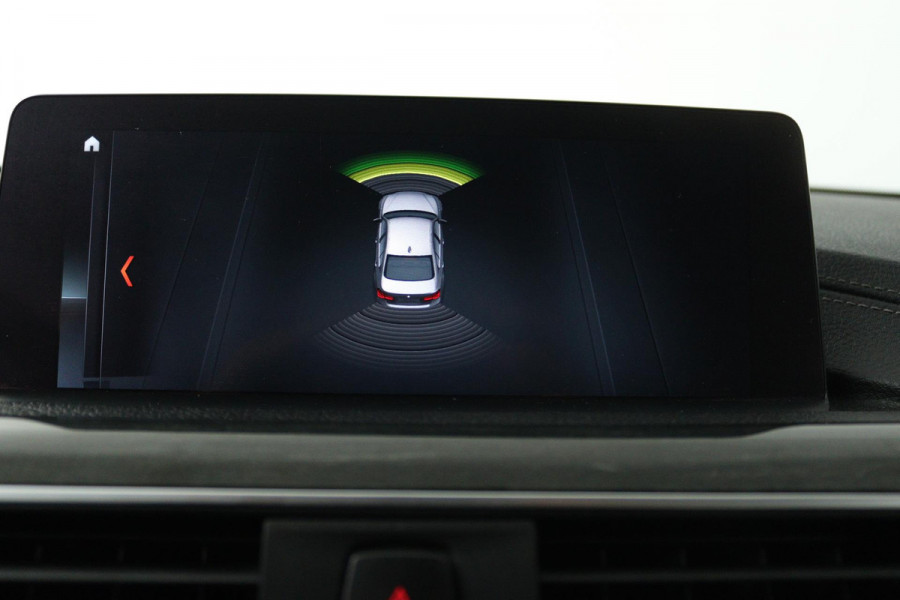 BMW 3 Serie 318i Luxury Edition (DEALER ONDERHOUDEN, PARKEERSENSOREN, NAVIGATIE, AUTOMAAT, CRUISE CONTROL)