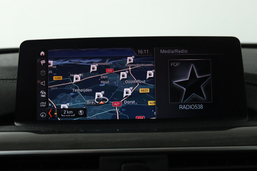 BMW 3 Serie 318i Luxury Edition (DEALER ONDERHOUDEN, PARKEERSENSOREN, NAVIGATIE, AUTOMAAT, CRUISE CONTROL)