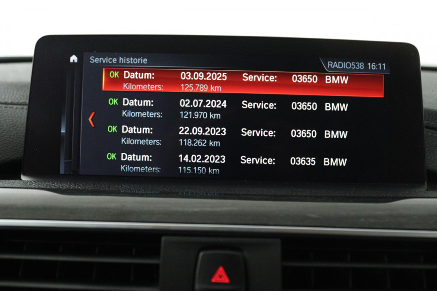 BMW 3 Serie 318i Luxury Edition (DEALER ONDERHOUDEN, PARKEERSENSOREN, NAVIGATIE, AUTOMAAT, CRUISE CONTROL)