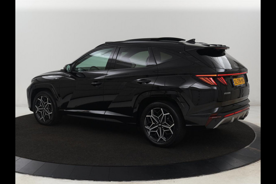 Hyundai Tucson 1.6 T-GDI PHEV N Line Sky 4WD | Panoramadak | Leder/Alcantara | Stoelverwarming | Camera | Carplay | Stuurverwarming | Keyless | Full LED | Navigatie | 19'' lichtmetalen velgen | Plug In