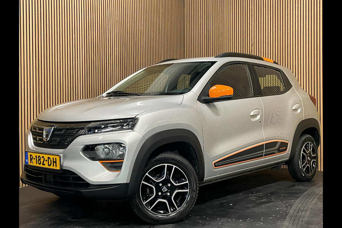 Dacia Spring Comfort Plus (Orange Pack) 27 kWh|AIRCO|LEDER|CARPLAY|CRUISE CTRL|ACHTERUITRIJCAMERA|NAVI|PARKEERSENS|LMV|NIEUWSTAAT|