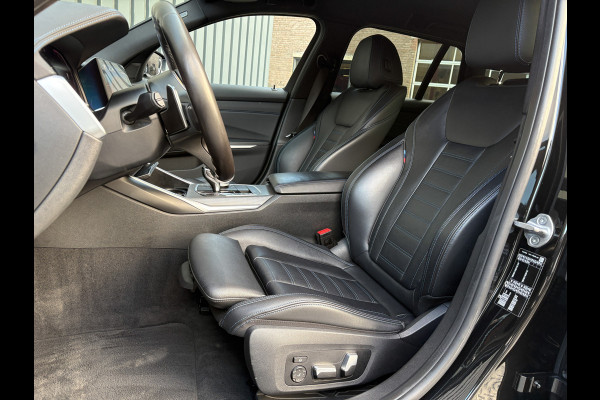 BMW 3-serie 320i High Executive | M-Sport | Laser | Stoelgeheugen | Trekhaak wegkl. | 19'' | Head Up | Camera | Keyless | Prijs Rijklaar!!