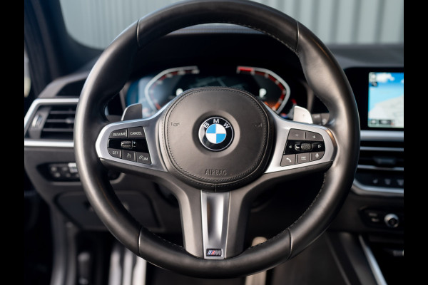 BMW 3-serie 320i High Executive | M-Sport | Laser | Stoelgeheugen | Trekhaak wegkl. | 19'' | Head Up | Camera | Keyless | Prijs Rijklaar!!