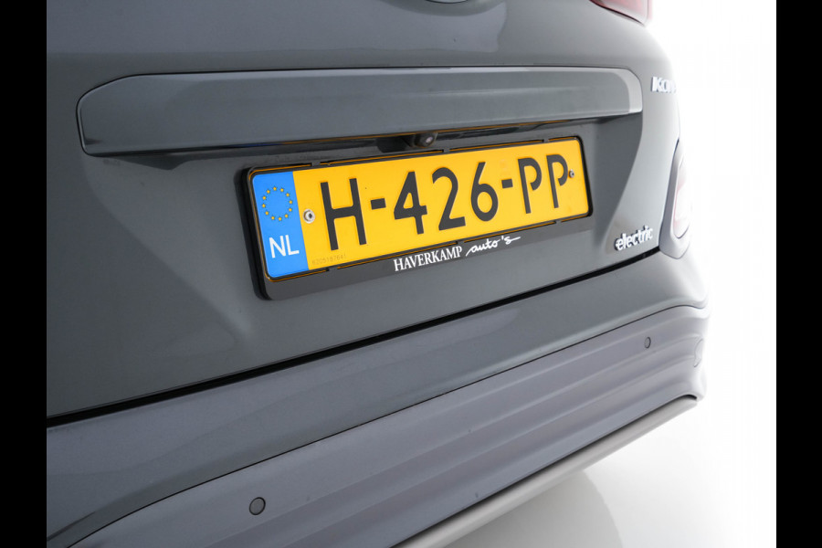 Hyundai Kona EV Premium 64 kWh ( Fase-3 ) { SOH-96%) Aut.* HEAT-PUMP | NAVI-FULLMAP | KEYLESS | CAMERA | DAB | ECC | PDC | ADAPTIVE-CRUISE | CCS-FASTLOADER | LANE-ASSIST | HEATED-COMFORTSEATS | 17''ALU*