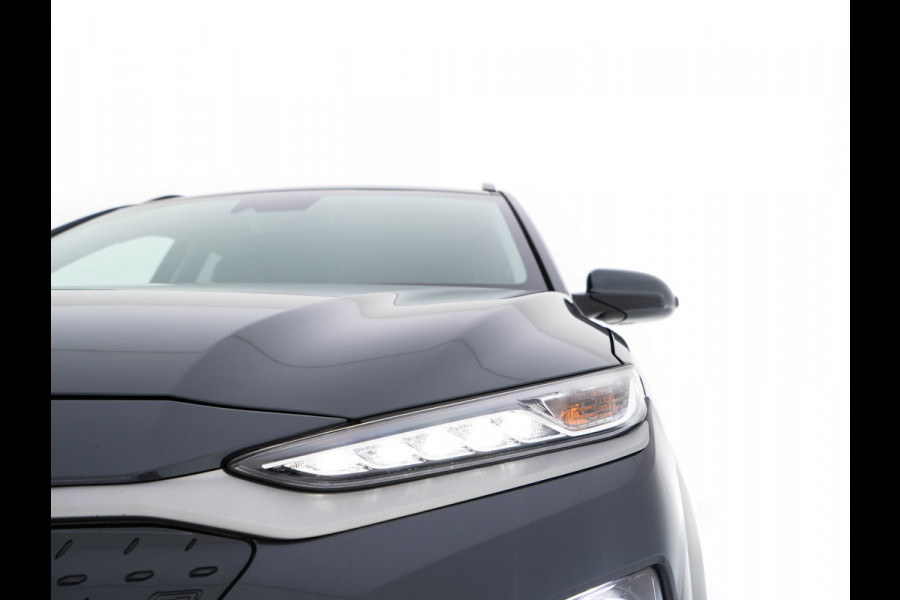 Hyundai Kona EV Premium 64 kWh ( Fase-3 ) { SOH-96%) Aut.* HEAT-PUMP | NAVI-FULLMAP | KEYLESS | CAMERA | DAB | ECC | PDC | ADAPTIVE-CRUISE | CCS-FASTLOADER | LANE-ASSIST | HEATED-COMFORTSEATS | 17''ALU*