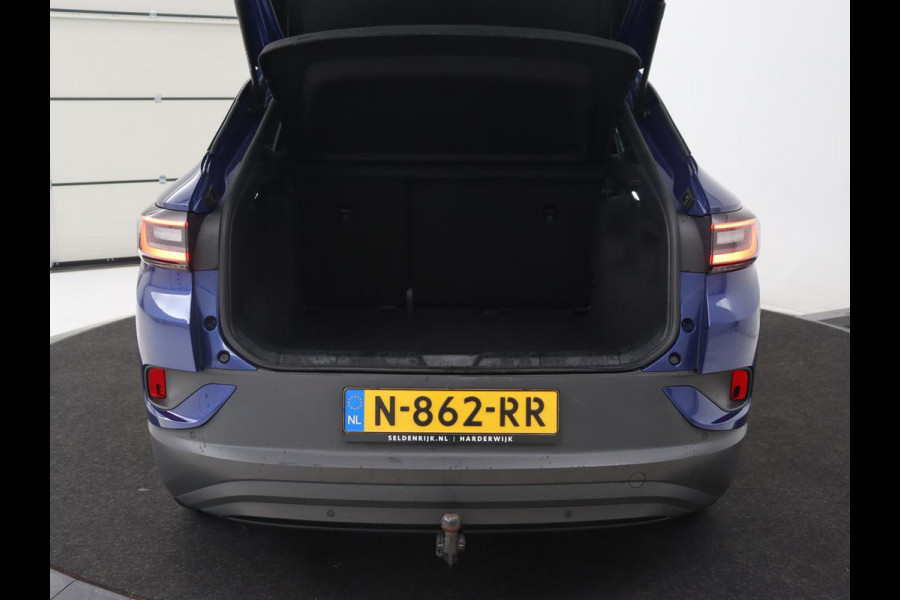 Volkswagen ID.4 Pro 77 kWh | Trekhaak | Stoelverwarming | Warmtepomp | Sfeerverlichting | Stuurverwarming | Carplay | Adaptive cruise | Keyless | Camera | Navigatie | Full LED