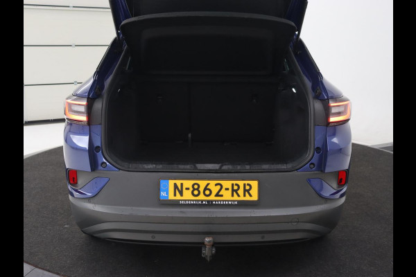 Volkswagen ID.4 Pro 77 kWh | Trekhaak | Stoelverwarming | Warmtepomp | Sfeerverlichting | Stuurverwarming | Carplay | Adaptive cruise | Keyless | Camera | Navigatie | Full LED