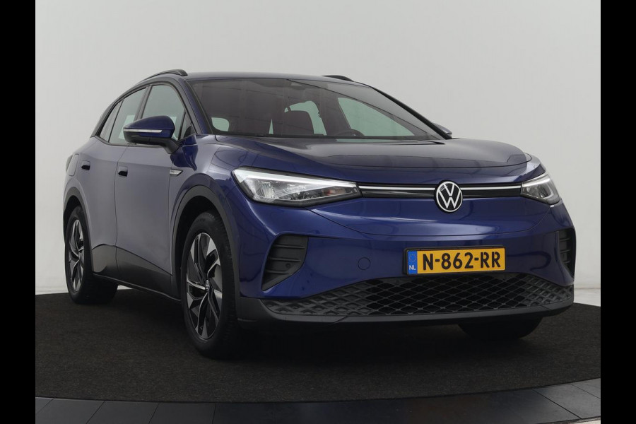 Volkswagen ID.4 Pro 77 kWh | Trekhaak | Stoelverwarming | Warmtepomp | Sfeerverlichting | Stuurverwarming | Carplay | Adaptive cruise | Keyless | Camera | Navigatie | Full LED