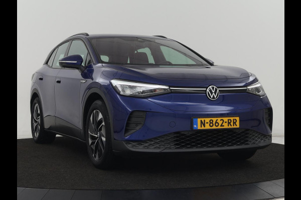 Volkswagen ID.4 Pro 77 kWh | Trekhaak | Stoelverwarming | Warmtepomp | Sfeerverlichting | Stuurverwarming | Carplay | Adaptive cruise | Keyless | Camera | Navigatie | Full LED
