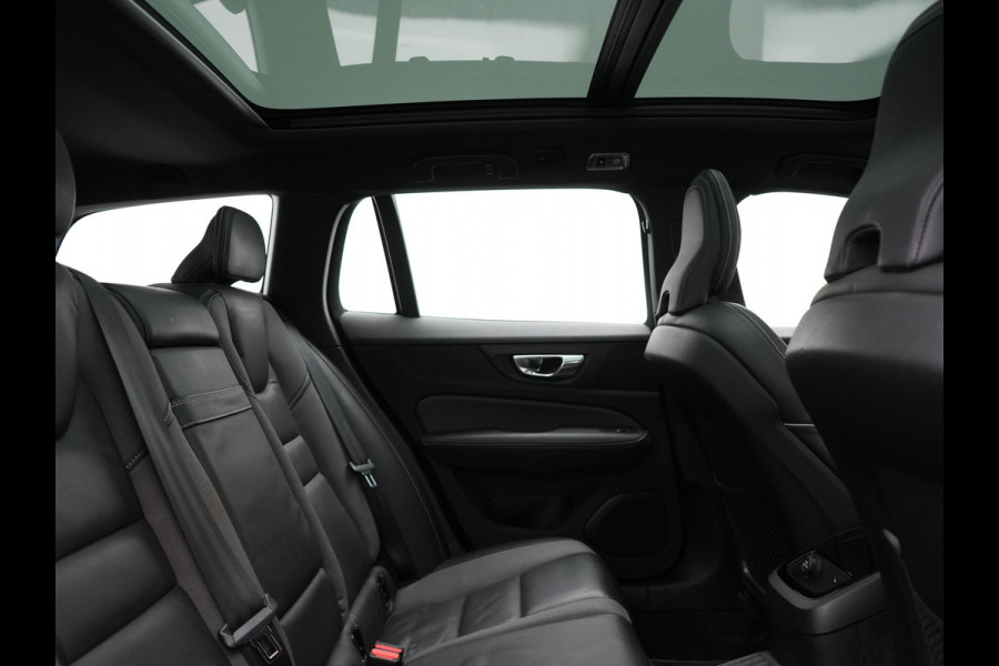 Volvo V60 T6 Twin Engine AWD R-Design Plug In Hybrid 340pk Dealer O.H. PHEV | Trekhaak Af Fabriek | Panodak | Head Up | Adaptive Cruise | 360 Camera | Lederen Sportstoelen Memory & Verwarmd | Apple Carplay | Stuur Verwarmd | Blis | Keyless | Navigatie | DAB |
