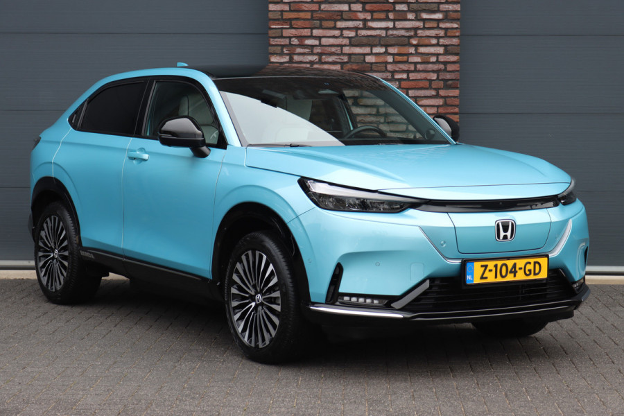 Honda e:Ny1 Elegance 69 kWh | Panoramadak | Adaptieve Cruise Control | Verwarmd Stuurwiel | Leder | Surround Camera | Apple Carplay/Android Auto | Dodehoekassistent | Stoelverwarming |