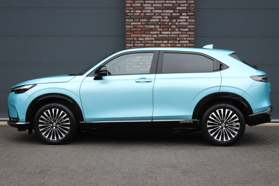 Honda e:Ny1 Elegance 69 kWh | Panoramadak | Adaptieve Cruise Control | Verwarmd Stuurwiel | Leder | Surround Camera | Apple Carplay/Android Auto | Dodehoekassistent | Stoelverwarming |