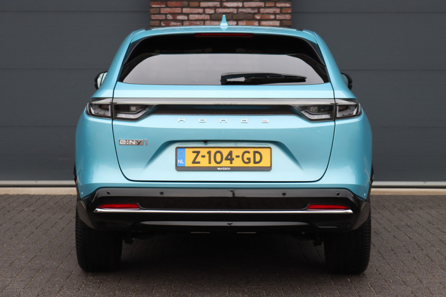 Honda e:Ny1 Elegance 69 kWh | Panoramadak | Adaptieve Cruise Control | Verwarmd Stuurwiel | Leder | Surround Camera | Apple Carplay/Android Auto | Dodehoekassistent | Stoelverwarming |