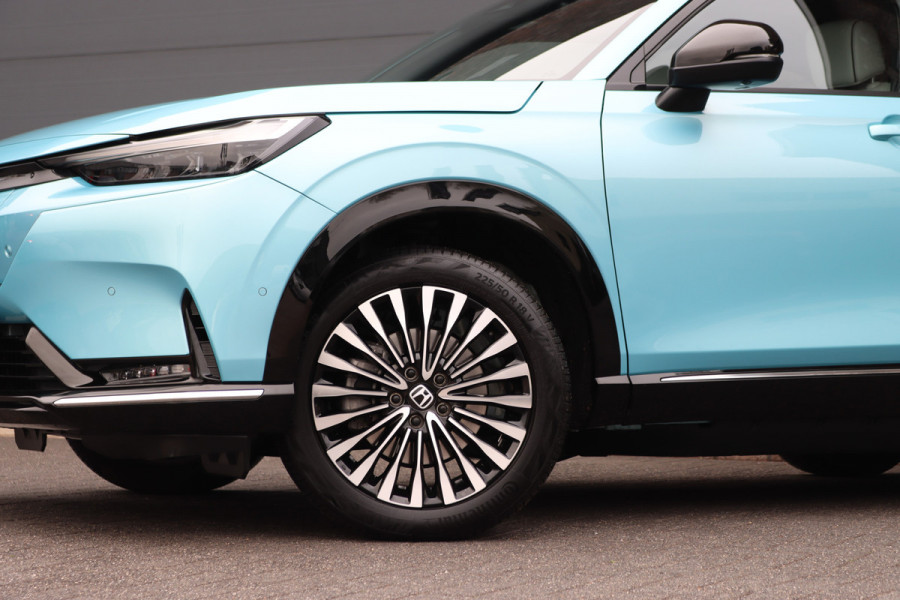 Honda e:Ny1 Elegance 69 kWh | Panoramadak | Adaptieve Cruise Control | Verwarmd Stuurwiel | Leder | Surround Camera | Apple Carplay/Android Auto | Dodehoekassistent | Stoelverwarming |