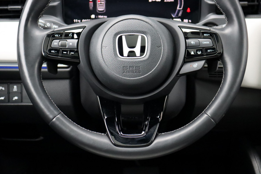 Honda e:Ny1 Elegance 69 kWh | Panoramadak | Adaptieve Cruise Control | Verwarmd Stuurwiel | Leder | Surround Camera | Apple Carplay/Android Auto | Dodehoekassistent | Stoelverwarming |