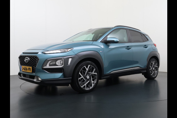 Hyundai Kona 1.6GDI HEV Hybride Premium Leder Trekhaak Krell®-Audio Adap.Cruise Stoel Verwarming/Ventilatie Camera Apple Carplay Android Auto Keyless Elek.Stoelen Lmv Head-Up Display Lane Assist Blind-Spot Monitoring Origineel Nederlandse Auto 1e Eigenaar