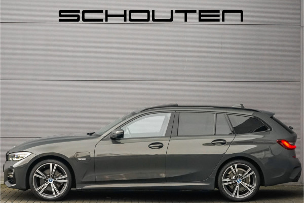 BMW 3 Serie Touring 320e M-Sport Dravitgrau Pano Leder Trekhaak 19"