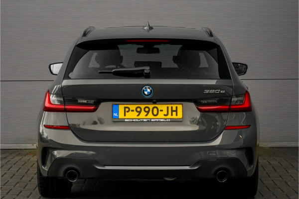 BMW 3 Serie Touring 320e M-Sport Dravitgrau Pano Leder Trekhaak 19"