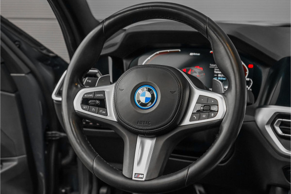 BMW 3 Serie Touring 320e M-Sport Dravitgrau Pano Leder Trekhaak 19"