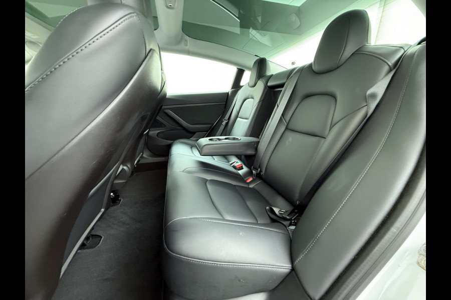 Tesla Model 3 RWD SR+ 325PK Lmv 18" AutoPilot FSD Leder Panoramadak Adaptive-Cruise Camera's Elektr.-Stuur+Stoelen+Spiegels+Geheugen+Easy-Entr Navi LED Comfortstoelen ACC DAB Voorverwarmen interieur via App Keyless One-Pedal-Drive SOH 86% Origineel Nederlandse auto tot 11kw laden thuis! 1.584kg licht!