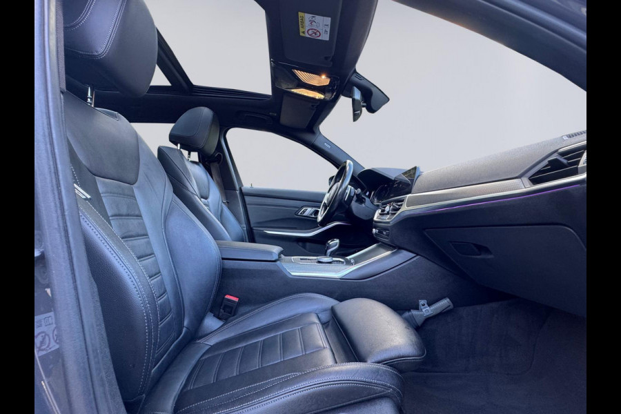 BMW 3 Serie Touring 330e M sport individual, dravitgrau, panodak,laser led, elec bedienbare trekhaak, vol opties, nl auto met nap