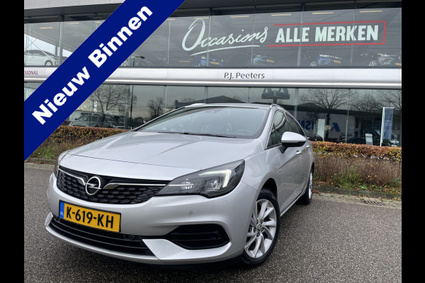 Opel Astra Sports Tourer 1.2 Business Elegance Airco - Cruise control - Parkeersensoren voor en achter - Achteruitrijcamera - Navigatie - Bluetooth - Keyless start and entry - Start/stop systeem - Stuur leder - Stuur multifunctioneel