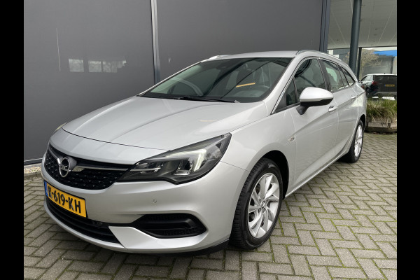 Opel Astra Sports Tourer 1.2 Business Elegance Airco - Cruise control - Parkeersensoren voor en achter - Achteruitrijcamera - Navigatie - Bluetooth - Keyless start and entry - Start/stop systeem - Stuur leder - Stuur multifunctioneel