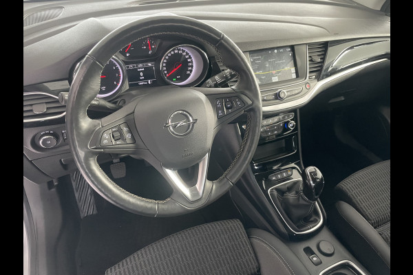 Opel Astra Sports Tourer 1.2 Business Elegance Airco - Cruise control - Parkeersensoren voor en achter - Achteruitrijcamera - Navigatie - Bluetooth - Keyless start and entry - Start/stop systeem - Stuur leder - Stuur multifunctioneel