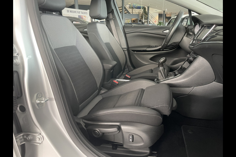 Opel Astra Sports Tourer 1.2 Business Elegance Airco - Cruise control - Parkeersensoren voor en achter - Achteruitrijcamera - Navigatie - Bluetooth - Keyless start and entry - Start/stop systeem - Stuur leder - Stuur multifunctioneel