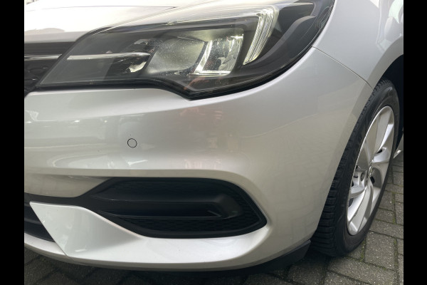 Opel Astra Sports Tourer 1.2 Business Elegance Airco - Cruise control - Parkeersensoren voor en achter - Achteruitrijcamera - Navigatie - Bluetooth - Keyless start and entry - Start/stop systeem - Stuur leder - Stuur multifunctioneel