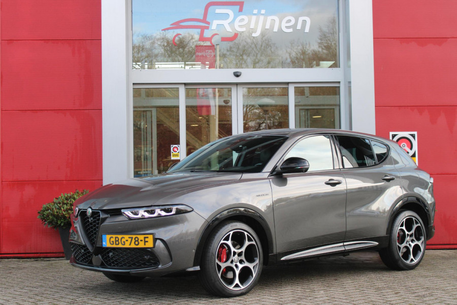 Alfa Romeo Tonale 1.5T 160PK Hybrid VELOCE | PREMIUM PACK: LEDEREN BEKLEDING/GEVENTILEERDE VOORSTOELEN/4-VOUDIG ELEKTRISCH VERSTELBARE LENDESTEUN VOORSTOELEN/HOOGGLANS ZWARTE RAAMOMLIJSTING/AMBIENT LIGHTING | TECHNOLOGY PACK: PARKEERWAARSCHUWING VOOR EN ACHTER/360° CAMERA/AUTOMATISCH INPARKEREN/ AUTONOMOUS DRIVING LEVEL 2: ADAPTIVE CRUISE CONTROL/LANE CENTERING ASSIST/TRAFFIC JAM ASSIST DODEHOEK DETECTIE AUTOMATISCH DIMMENDE BUITENSPIEGELS ELEKTRISCH BEDIENBARE ACHTERKLEP | WINTERPACK: STOELVERWARMING VOOR/STUURVERWARMING/VERWARMBARE RUITENSPROEIERS | 19" LICHTMETALEN VELGEN  | DRAADLOZ