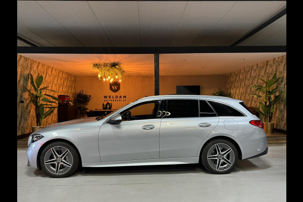 Mercedes-Benz C-Klasse Estate 300 e AMG Line Garantie Trekhaak Massage Pano Ambient 360 Blindspot Elek Achterklep StuurVW Rijklaar