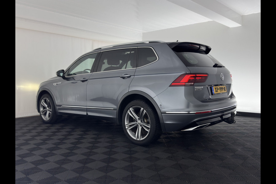 Volkswagen Tiguan Allspace 1.5 TSI R-line Highline Business (7-Pers.) (INCL-BTW) Aut * PANO | NAVI-FULLMAP | XENON | ALCANTARA | HEATED-ERGONOMIC-SPORTSEATS | KEYLESS | PRIVACY-GLASS | CAMERA | DAB | DIGI-COCKPIT | PDC | TOWBAR | ECC | 19"ALU*