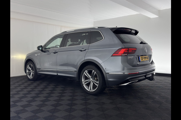 Volkswagen Tiguan Allspace 1.5 TSI R-line Highline Business (7-Pers.) (INCL-BTW) Aut * PANO | NAVI-FULLMAP | XENON | ALCANTARA | HEATED-ERGONOMIC-SPORTSEATS | KEYLESS | PRIVACY-GLASS | CAMERA | DAB | DIGI-COCKPIT | PDC | TOWBAR | ECC | 19"ALU*