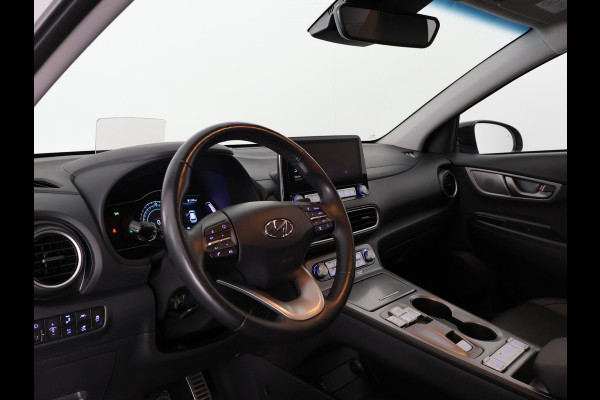 Hyundai Kona PRIMIUM EV 64 KWH 1e EIG ACCU 92% GARANTIE 10-2030 BEREIK 466 KM ! LEDER. STUUR/STOEL VERWARMING.DODE HOEK DETECTIE