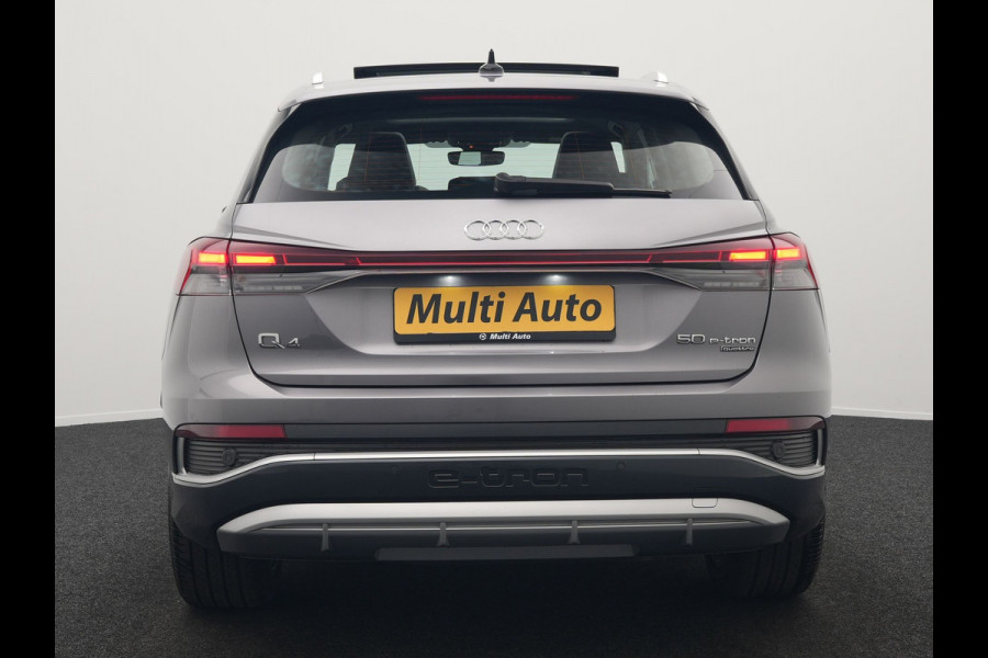 Audi Q4 e-tron 50 quattro S Line 77 kWh 299pk Dealer O.H. INCL BTW | Panodak | Lederen Sportstoelen Verwarmd | Keyless | Navigatie | Cruise Control | Virtual | DAB | Taifungrau Metallic |