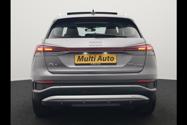 Audi Q4 e-tron 50 quattro S Line 77 kWh 299pk Dealer O.H. INCL BTW | Panodak | Lederen Sportstoelen Verwarmd | Keyless | Navigatie | Cruise Control | Virtual | DAB | Taifungrau Metallic |