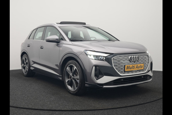 Audi Q4 e-tron 50 quattro S Line 77 kWh 299pk Dealer O.H. INCL BTW | Panodak | Lederen Sportstoelen Verwarmd | Keyless | Navigatie | Cruise Control | Virtual | DAB | Taifungrau Metallic |
