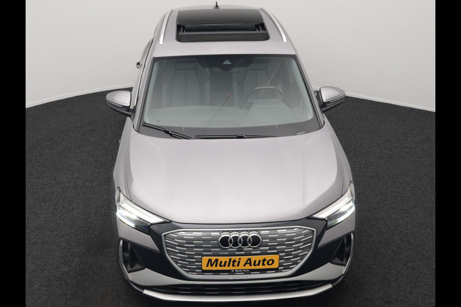 Audi Q4 e-tron 50 quattro S Line 77 kWh 299pk Dealer O.H. INCL BTW | Panodak | Lederen Sportstoelen Verwarmd | Keyless | Navigatie | Cruise Control | Virtual | DAB | Taifungrau Metallic |