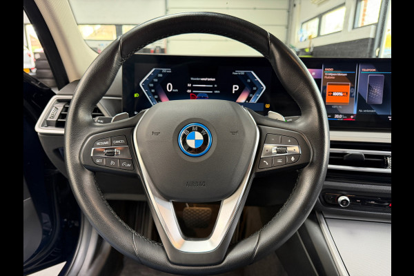 BMW 3-serie 320e LCI |Facelift | Widescreen | 2 sets velgen | Plug-in | NL Auto | NAP