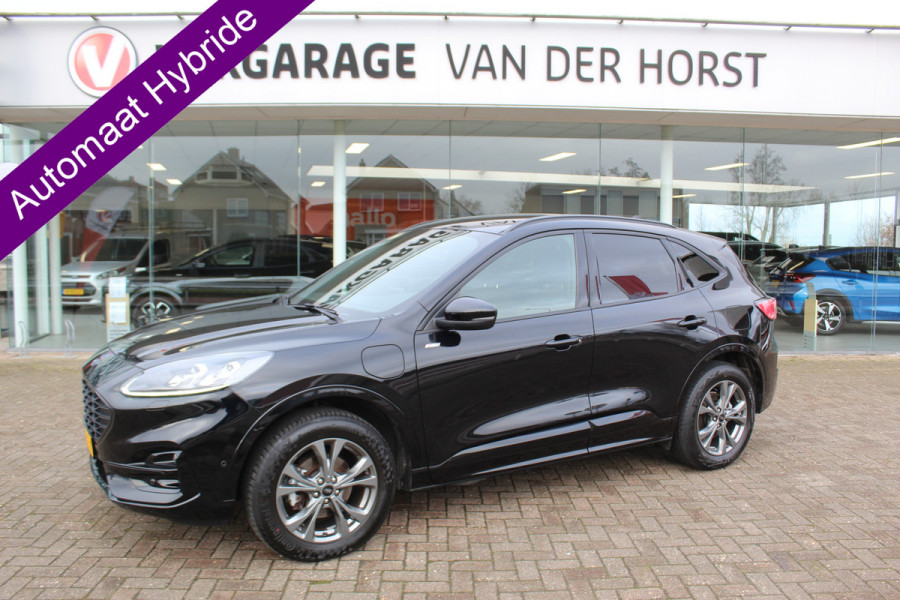 Ford Kuga 2.5-225pk Plug-in Hybrid ST-Line X. Hybride rijden voor een reële prijs ! Adaptive Cruise Control, Stoel- en voorraamverwarming, Climate Control, Metallic lak, Camera v+a, Elektr. achterklep, Side- en lane assist etc.