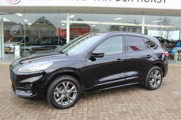 Ford Kuga 2.5-225pk Plug-in Hybrid ST-Line X. Hybride rijden voor een reële prijs ! Adaptive Cruise Control, Stoel- en voorraamverwarming, Climate Control, Metallic lak, Camera v+a, Elektr. achterklep, Side- en lane assist etc.
