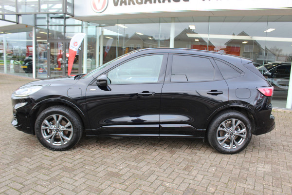 Ford Kuga 2.5-225pk Plug-in Hybrid ST-Line X. Hybride rijden voor een reële prijs ! Adaptive Cruise Control, Stoel- en voorraamverwarming, Climate Control, Metallic lak, Camera v+a, Elektr. achterklep, Side- en lane assist etc.