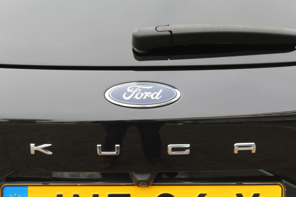 Ford Kuga 2.5-225pk Plug-in Hybrid ST-Line X. Hybride rijden voor een reële prijs ! Adaptive Cruise Control, Stoel- en voorraamverwarming, Climate Control, Metallic lak, Camera v+a, Elektr. achterklep, Side- en lane assist etc.