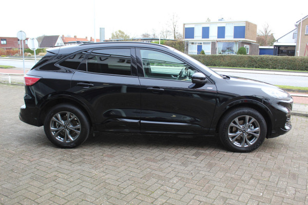 Ford Kuga 2.5-225pk Plug-in Hybrid ST-Line X. Hybride rijden voor een reële prijs ! Adaptive Cruise Control, Stoel- en voorraamverwarming, Climate Control, Metallic lak, Camera v+a, Elektr. achterklep, Side- en lane assist etc.